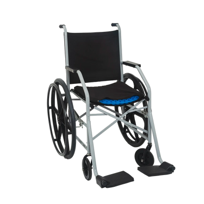 Almofada de assento ergonômica em gel de silicone com estrutura em favo de mel, projetada para absorção de impacto, distribuição de peso e alívio de pressão no cóccix, proporciona máxima sensação de frescor, sustentação anatômica e alívio imediato para pontos de pressão.