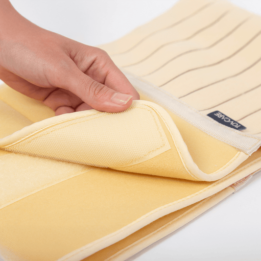 Faixa elástica ortopédica abdominal e torácica, desenvolvida em tecido elástico macio com fecho em velcro para contenção e suporte pós-cirúrgico, dispositivo ortopédico de alta performance que assegura imobilização correta e alívio imediato da dor.
