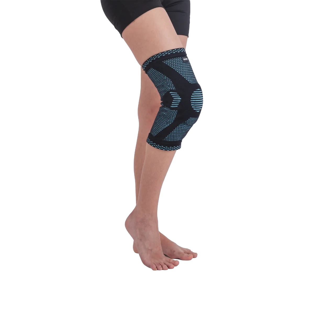 Joelheira elástica ortopédica com anel de silicone e hastes flexíveis, confeccionada em malha de compressão 3D respirável com anel patelar de silicone para absorção de impacto, garante sustentação firme com máxima liberdade de movimento e retenção do calor terapêutico.